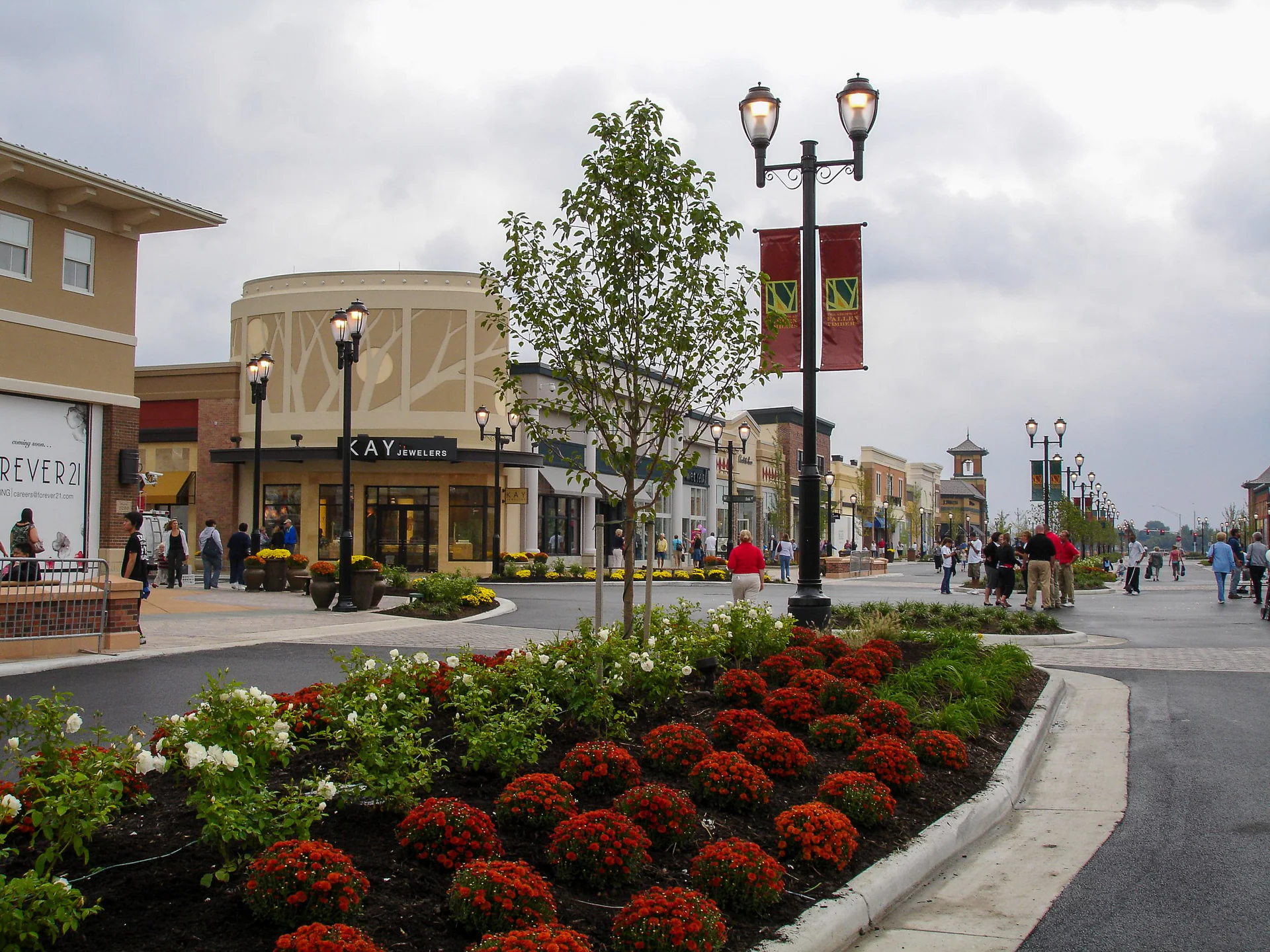 Commercial streetscape with pedestrian planting and seasonal color